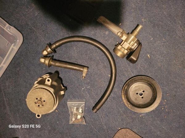 1970 ls6 beautiful survivor smog parts.  Early april 70 pump w factory correct opaque fan