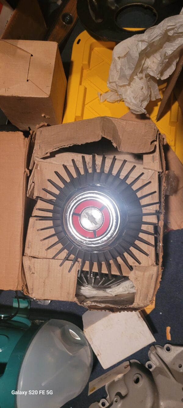 4 nos 1967 bolt on gm corrvette centers.   427 genuine in the gm boxes