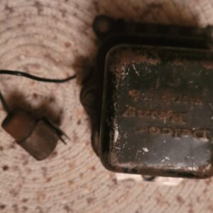 1969 z28 copo volt regulator dated may 69 needs plastic piece on tabs. W capacitor