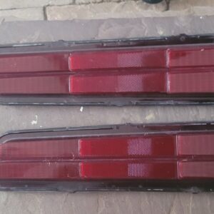 Rally sport camaro oem taillight lenses and stainless trim. 1969. Nice ones.