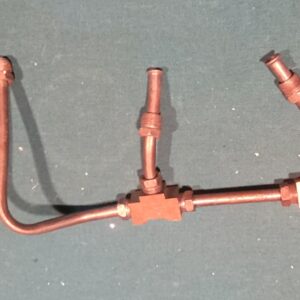 Original corvette 67  3x2 fuel lines.  Both blocks have assembly line stampings