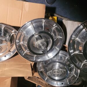 Nice set of clean almost 70 year old hubcaps 56 57 58 corvette early.