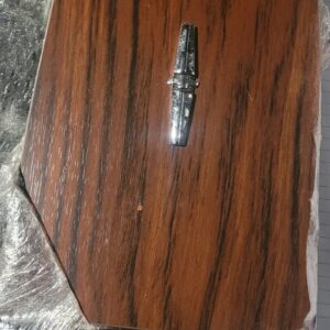 1969 camaro rosewood console insert..repro is wrong color, wrong grain. This is super nice all studs intact. Nice piece.