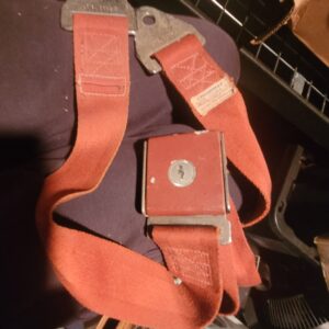 Red 63 corvette seat belt assembly. As shown....nice shape for a 64 year old seat belt.