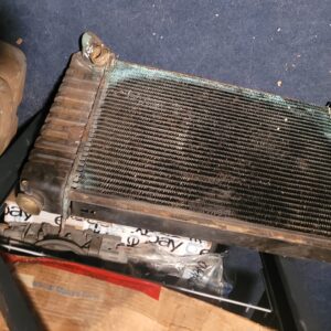 1967 corvette 427 4 speed radiator. May 67 dated.  Big block harrison curved neck.   Original core. W curved necjks and mk original assembly line tag always missing.