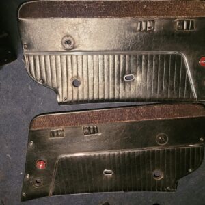 1963 corvette mint original black door panels.  Clean and dye the carpet strip and these are mint. 62 years old!!   Great find