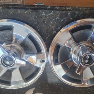 Set of nice used 66 corvette hubcaps 327 and 427 .  No pitting on center caps as they always are.  Very nice 60 year old parts. 259.00 pr.