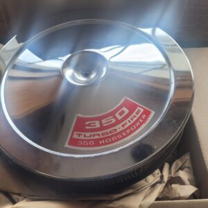 350 350 hp original air cleaner. Super nice original chrome top and decal. Alligator skin hose. Hard to find a nicer 60 year old ac