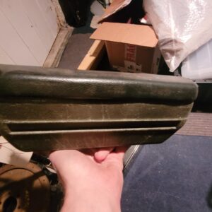 Green chevelle arm rest plastic in nice shape  pad cracked but for a driver maybe so so. 
