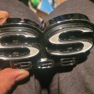 1969 gm embossed early design chevelle ss grille emblem 396 super sport. Mint with attach bar etc