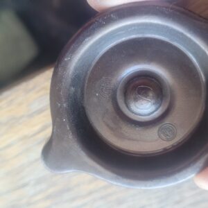 Nos cap for valve cover.  396 427 I think this is 65 to 67 corvette bb. Witj painted valve covers not chrome  It is a brown color. Shows a little discoloration from sitting. 