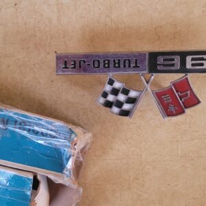 Pair of early style correct finish  65 corvette ss 396 emblems in gm boxes. Not like the later made gm emblems  Mint pair