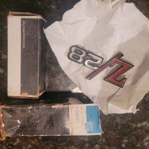 68 z28 nos gm emblems pair in boxes...302. 