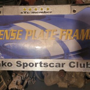 New in plastic wrapper. Sportscar club syc  license plate frame. 