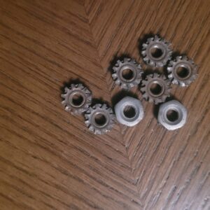 A set of 8 speaker nuts.  These are from a 69 camaro rear tray speakers ..4 each side. Correct.   15.00...detail items not usually found w atttached washers .