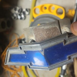 Bowtie.  Emblem.  Copo camaro grill w bracket driver shape at best has oem bracket which is worth the price.