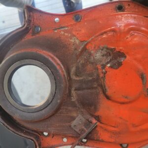 1970 late jan dated ls6 timing cover 8 inch.  454  5th week 70 dated. Has pushed out area as shown  probably for a hi perf timing set. Can straighten it .priced accordingly 