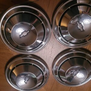A set of 4 mint nos dog dish caps. Beautiful no dents no use. Paint is as it was new