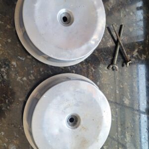 A set of 1956 1957 corvette dual 2x4 air.cleaners...good shape for 70 year old pieces come w 2 original wing nuts and 2 studs.  One stud is the original.