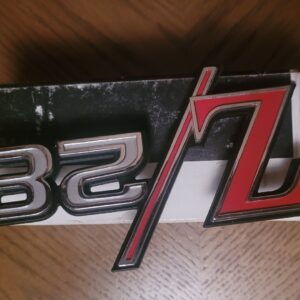 1969 z28 rear emblem in gm box. .mint 302 camaro.
