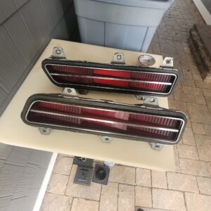 A pair of rs 69 tail lights.  W back housings