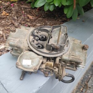 A 4346 780 holley complete as shown...needs rebuild. Has a small broken piece on back vent. Non functional and can easily be fixed if desired.  Why pay 3k for a restored piece.