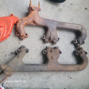 A pair of may 69 exhaust manifolds...z28 camaro 826 527 gm originals. Cast numbers are good.