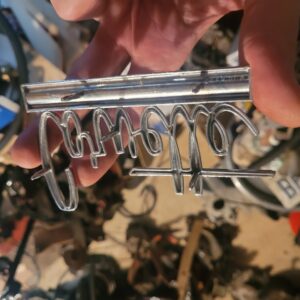 Nos corvette emblem.  Rear and front big block hood 65 66.   65 66 67 rear ..nos in box.