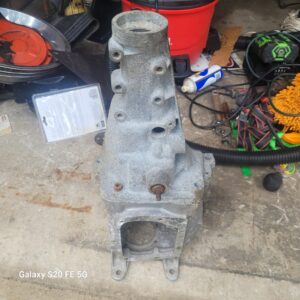 A tail and main case.  May have cone from 64 corvette ....nice case and tail.    Muncie 4 speed. 375.00 for both pieces.