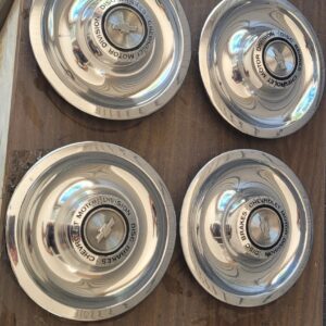 1967 rally caps disc brakes. Chevelle camaro nova corvette ...one has a ding, otherwise this is a fantastic original set of 1967 parts. Has blsck paintbon back like the assembly line 67s had