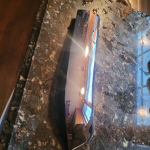 Nos 57 chevy belair rh grille molding  gm !  Has light scratches but is 70 years old. Many would buff out. Casting numbers present.  Hard find.