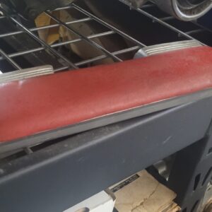 1963 original corvette red arm rest with oem pad in nice shape.