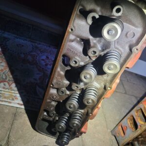 May 1 69 head 840 casting squareport...complete looks like came off running motor. Has a small broken casting by a head bolt hole. Was running but should be fixed. 