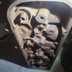 990 head squareport big block    exhaust and intake ports are stock not hogged out , open chamber ls7..3 marks not sure if those ports need guides etc or ...dont see any visual damage.  300 in stock all years.