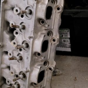 67 corvette aluminum l88 l89 aluminum head #392. Have pairs and singles. Has a weld near date code. Noone converted this to open chamber like most.