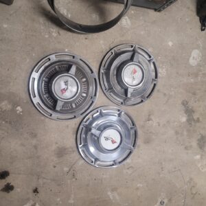 3 1959 1960  impala big car hubcaps three woukd clean up nice ...better than most 66 year old hubcaps.  Just need cleaning to be nice driver caps. 
