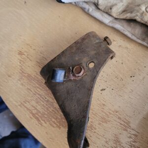 1970 up bracket smog w bayyery cable clip and bolt...454 oem.gm.